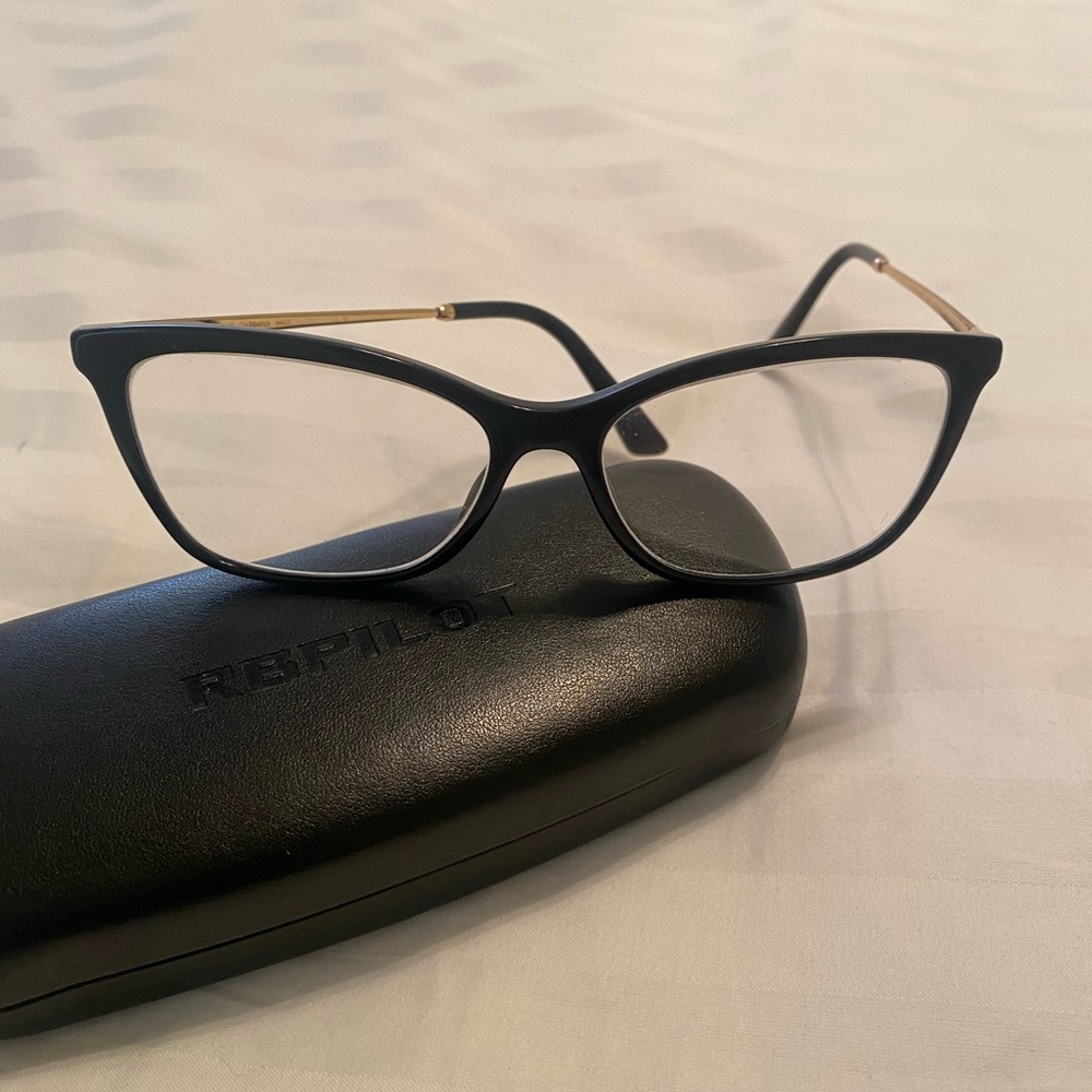 Dolce & Gabbana eyeglasses, black rims with gold earpieces